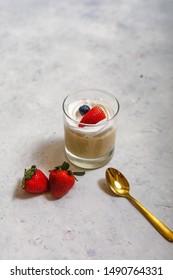 Home Made Fruits Ice Cream With Gold Spoon  On White Table 