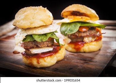 Home Made Gluten Free Mini Burgers Or Sliders With Beef, Egg, Lettuce, Cheese And Sauce