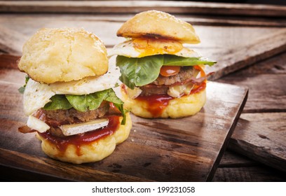 Home Made Gluten Free Mini Burgers Or Sliders With Beef, Egg, Lettuce, Cheese And Sauce