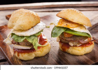 Home Made Gluten Free Mini Burgers Or Sliders With Beef, Egg, Lettuce, Cheese And Sauce