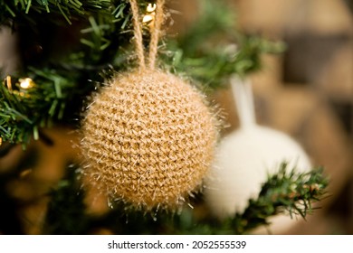 Home Made Knitted Christmas Tree Toy. From DIY Series. Religious Holidays With Family, Home Traditions. Greeting Card Concept. Spruce Decoration.