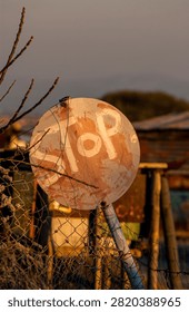 Home made and make shift stop sign in a South Africa township.