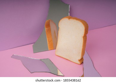 Home Made Organic Sliced Bread With Broken Mirror In Pink Purple Room.