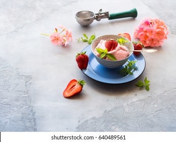 Home Made Strawberry Ice Cream In Bowl With Min Leaves