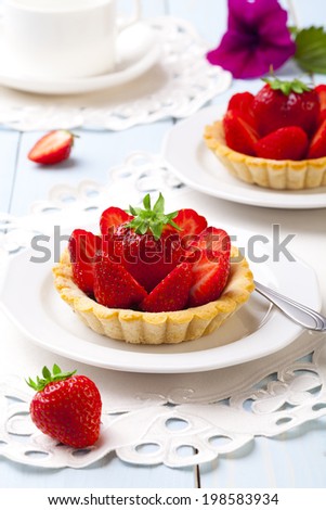 Similar – Image, Stock Photo Delicious strawberry tartlets with vanilla cream in heart shape