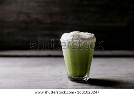 Similar – Image, Stock Photo Matcha latte art with succulent at a coffee shop on a table