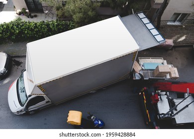 The Home Mover Company Moves The House With The Help Of An Elevator.