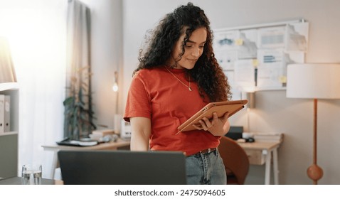 Home office, business woman and tablet for freelance, reading information and planning as creative agency. House, female graphic designer and laptop for design inspiration, feedback and remote work - Powered by Shutterstock