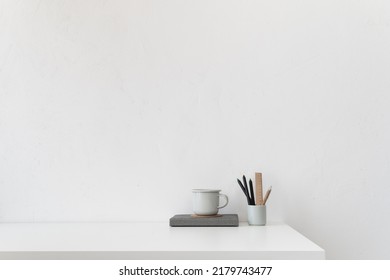 Home Office, Creative Desk With Coffee Mug, Office Supplies And White Space. Mockup.