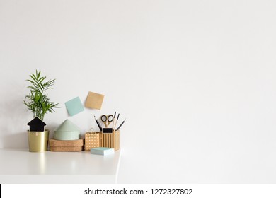 Home Office Desk With Cork Boxes, Stationery, Sticky Notes And White Wall For Mock Up Or Copy Space.