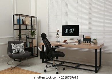 Home office interior with comfortable workplace near window