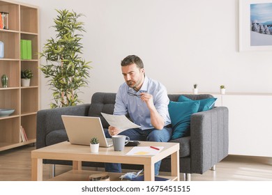 Home office, man working from home portrait