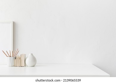 Home Office, Minimal Workspace. Desk With Office Supplies White Wall And Empty Product Space.
