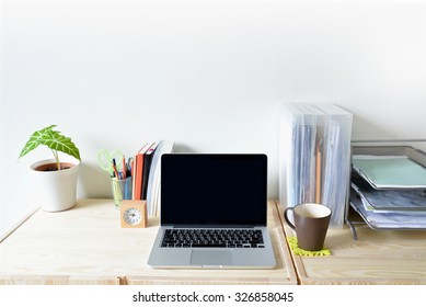 Home Office Table With Computer, Stationary And Coffee