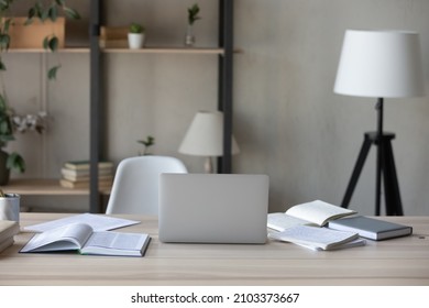 Home Office Workspace Or Studying Interior With No People. Work Table With Open Books And Laptop Computer, Chair At Desk. Workplace For Businessperson, Employee, Worker, Student. Nobody, Objects