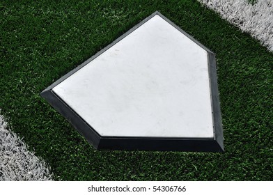Home Plate On Baseball Field With Artificial Turf