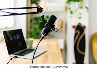 Home Podcast Broadcasting Studio With Laptop Computer And Microphone. Empty Journalist Freelancer Workspace