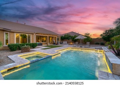 A home pool at sunset - Shutterstock ID 2140558125