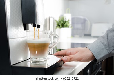Home professional coffee machine with cappuccino cup. coffee machine latte macchiato cappuccino milk foam prepare concept