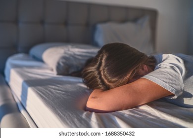 Home Quarantine Self Isolation Woman Tired Bored Cant Get Up Of Bed Staying Asleep Late Afternoon Sleepiness Sleep Disorder. Sad Single Girl Crying Alone.