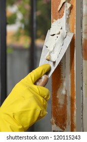 Home Renovation, Worker Remove Paint With Scraper