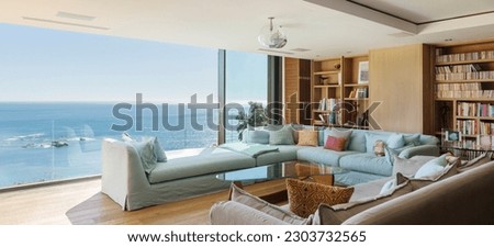 Home showcase living room overlooking ocean