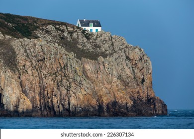 Home Sitting On A High Cliff In The Ushant Island (aka Ouessant), Brittany, France