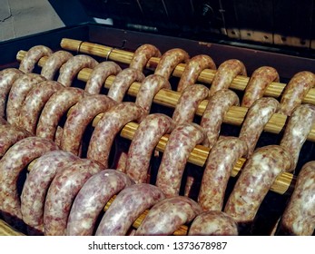 Home Smokehouse. Sausage During Smoking