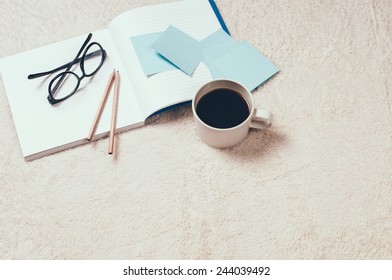 Home Study: Notebooks, Coffee And Glasses On The Floor, Preparing For Exams.