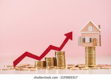 Home Sweet Home Put On The Stack Gold Coin And Red Arrow Graph With Growing Value On The Pink Background In The Office, Loan For Real Estate Or Saving Money For Buy House To Family Concept.