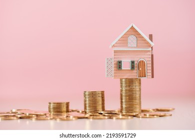 Home Sweet Home Put On The Stack Gold Coin With Invest Is Destination On The Pink Background In The Office, Loan For Real Estate Or Saving Money For Buy A New House To Family In The Future Concept.