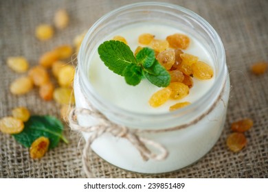 Home Sweet Yogurt With Raisins In A Glass Jar