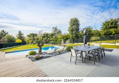 home swimming pool in garden and terrace