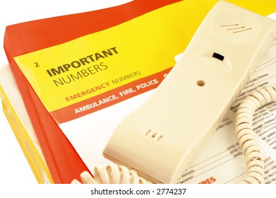 Home Telephone On Top Of Phone Directories And Emergency Numbers