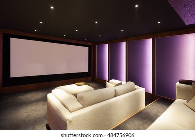 Home theater, luxury interior, comfortable divan and big screen