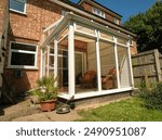 Home with white glass conservatory