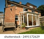 Home with white glass conservatory