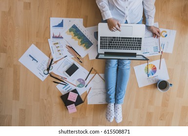 Home workplace concept - girl working with reports and having a coffee. - Shutterstock ID 615508871