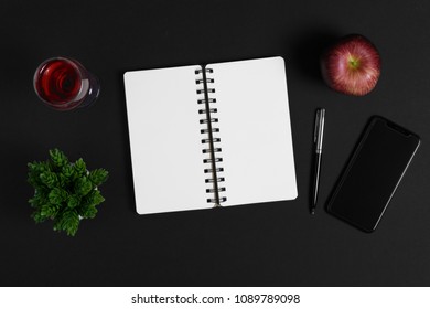 Home workspace desk table. Black background with copy space. - Powered by Shutterstock