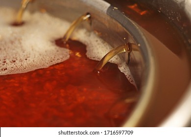 Homebrewing Mash Process: Deep Red Beer Wort 