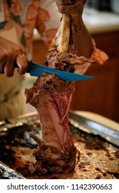 Home-cooked Lamb Getting Sliced Up For Family Dinner