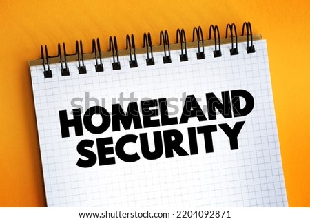 Homeland Security text on notepad, concept background