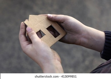 Homeless Boy Holding A Cardboard House, Dirty Hand