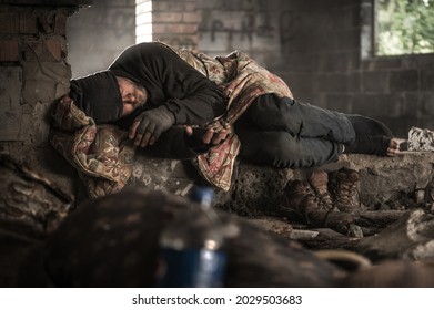 Homeless Caucasian Men In His 40s Being Under Influence, Sleeping Inside Abandoned House During Cold Fall Weather