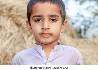 Homeless Cute Boy In White Asian Clothes Young Child With Sad Face