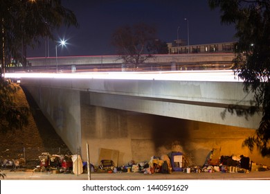 A homeless encampment under a Downtown Los Angeles freeway.