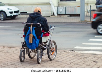 A Homeless Man In A Wheelchair