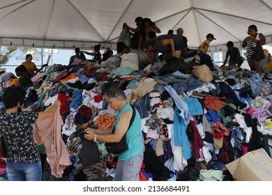 Homeless People Collect Clothes From Volunteers Donations. Victims Of Natural Disaster Landslide At Petropolis City, Lost All Belongins At Morro Da Oficina. Rio De Janeiro, Brazil 02.25.2022