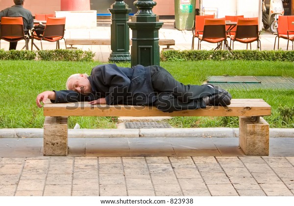 Homeless Person Sleeping On Bench Stock Photo Edit Now 3938