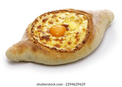 homemade adjaruli khachapuri ( A boat-shaped traditional cheese bread from the Adjara region of Georgia ) isolated on white background